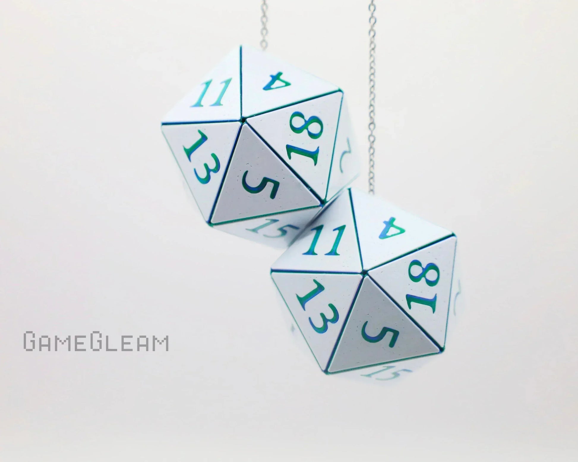 Pair of white twenty-sided dice hanging on a chain, ideal gamer car accessory gift.