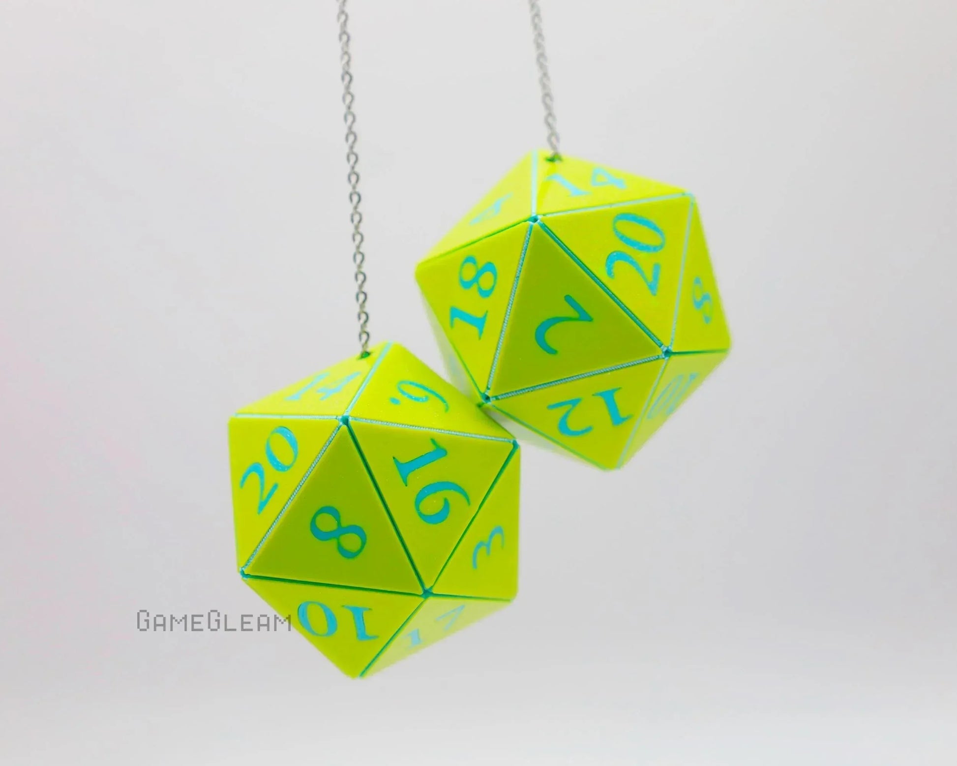 Neon green twenty-sided dice car charm with blue numbers hanging on a chain, gamer gift.