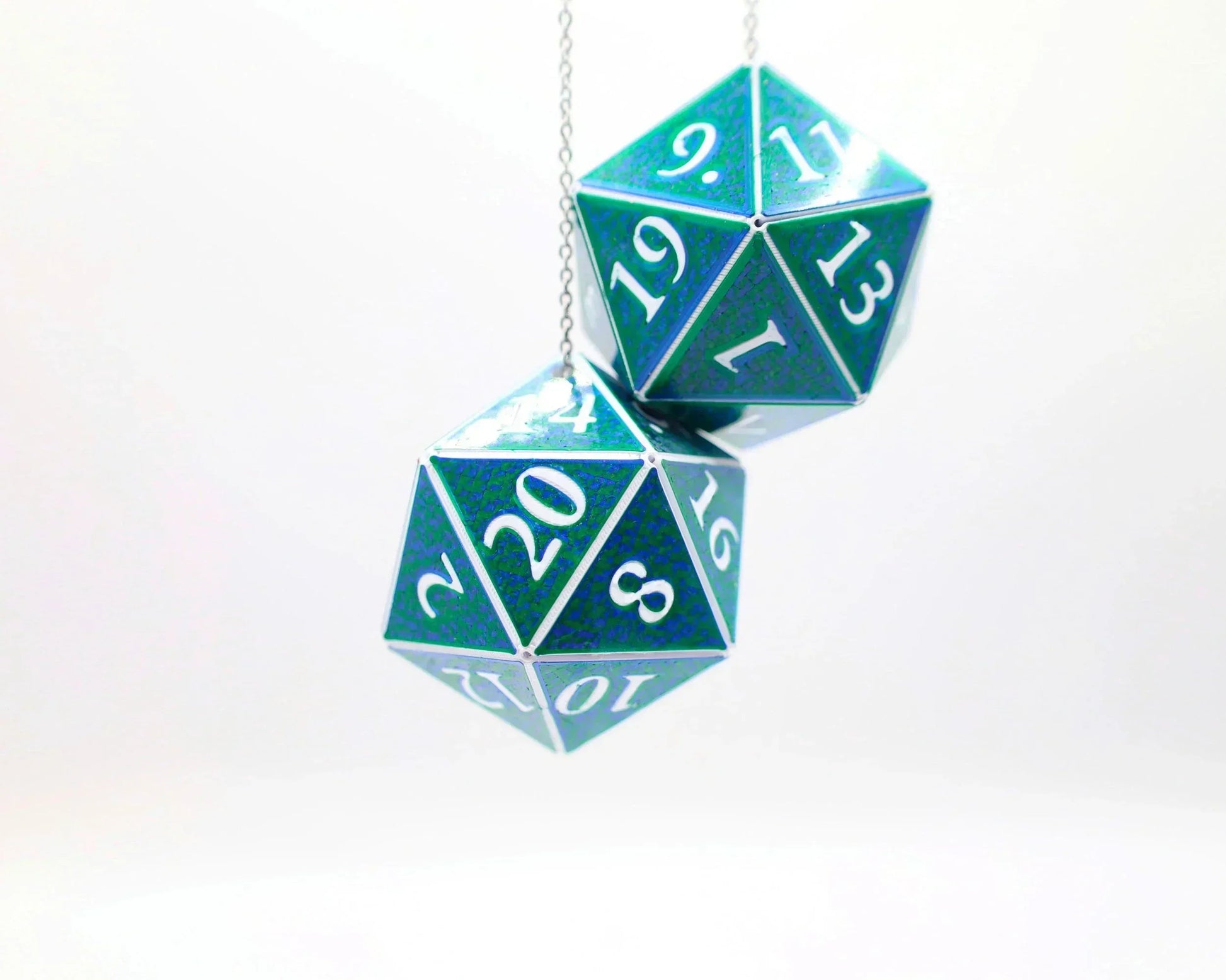 Holographic teal 20-sided dice car charm for tabletop RPG fans, hanging on a chain.