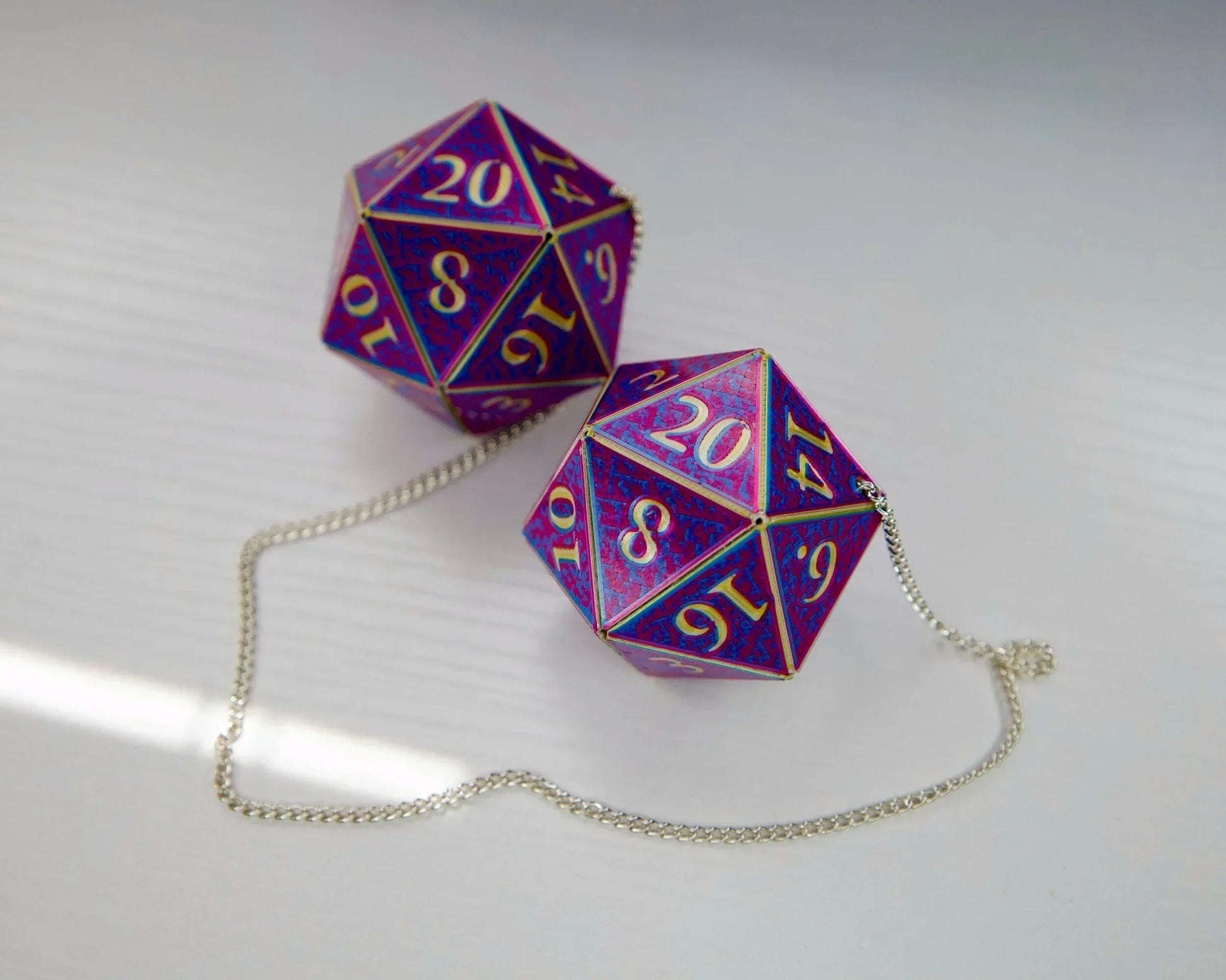 Holographic purple twenty-sided dice car mirror charm with silver chain for RPG fans