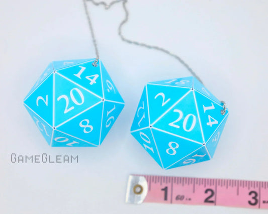 Pair of large blue twenty-sided dice car charms with white numbers, silver chains, and a measuring tape