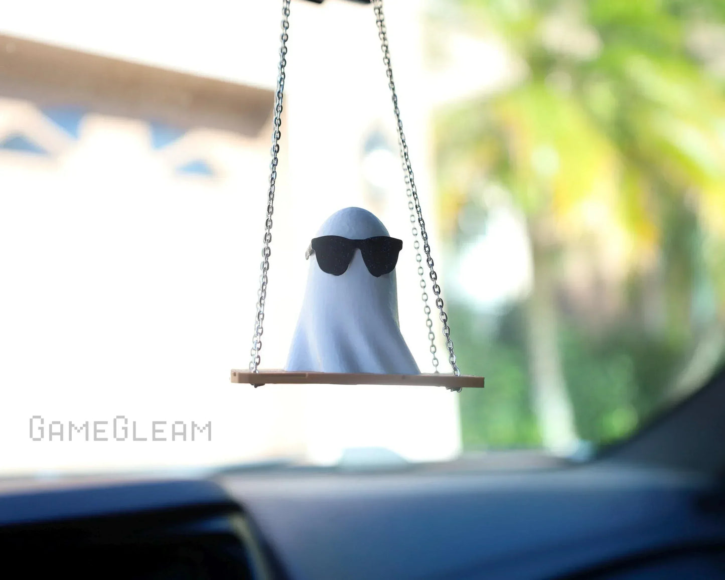 Handmade ghost car charm with sunglasses on swing, hanging from rearview mirror