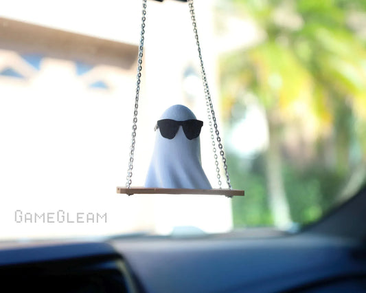 Handmade ghost car charm with sunglasses on swing, hanging from rearview mirror