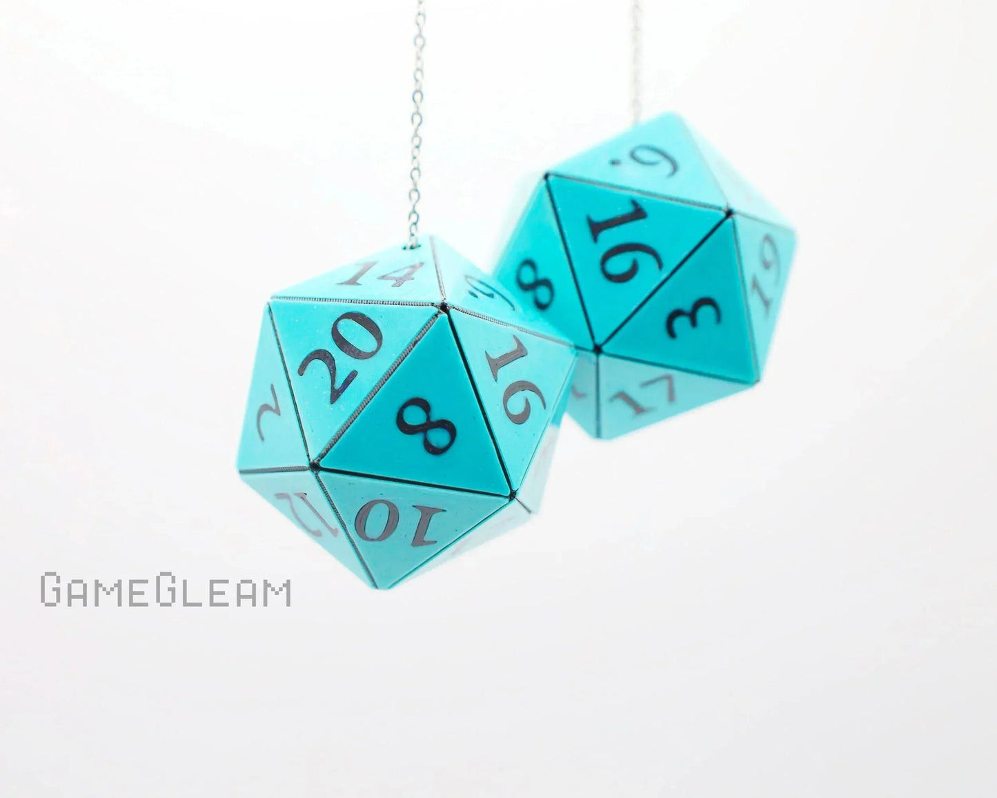 Handmade turquoise twenty-sided dice car charms with silver numbers, hanging on chains