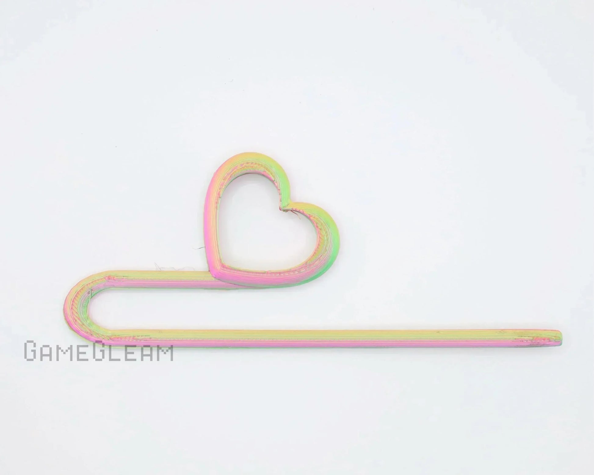 Pastel rainbow heart-shaped 3D printed bookmark on a white background