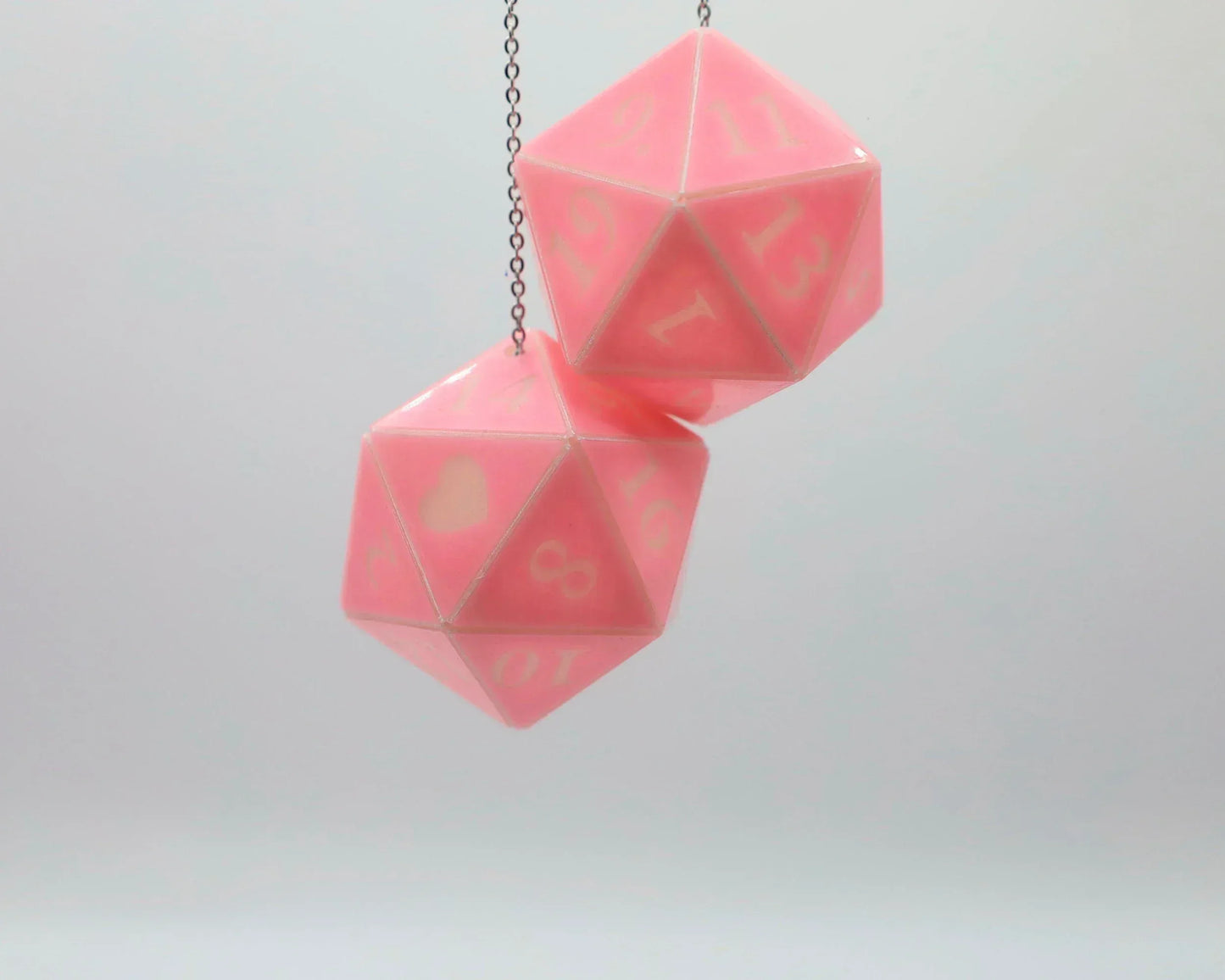 Hanging pink twenty-sided dice car charm with white numbers, handmade gamer accessory