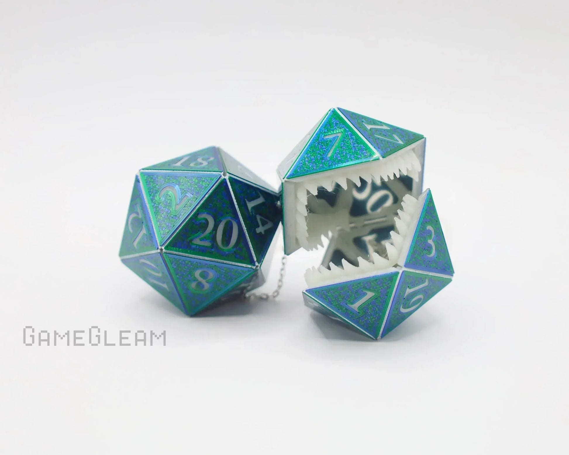 Holographic blue 20-sided dice with one featuring sharp teeth, geek car accessory for gamers