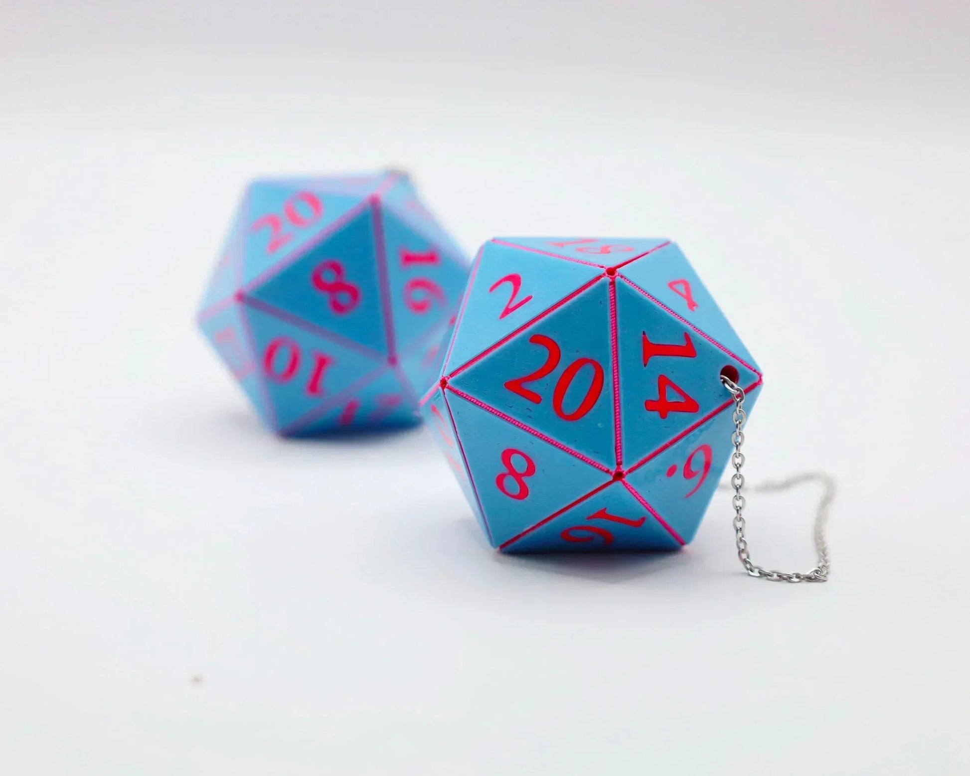 Blue twenty-sided dice car charm with red numbers and silver chain, gamer gift accessory