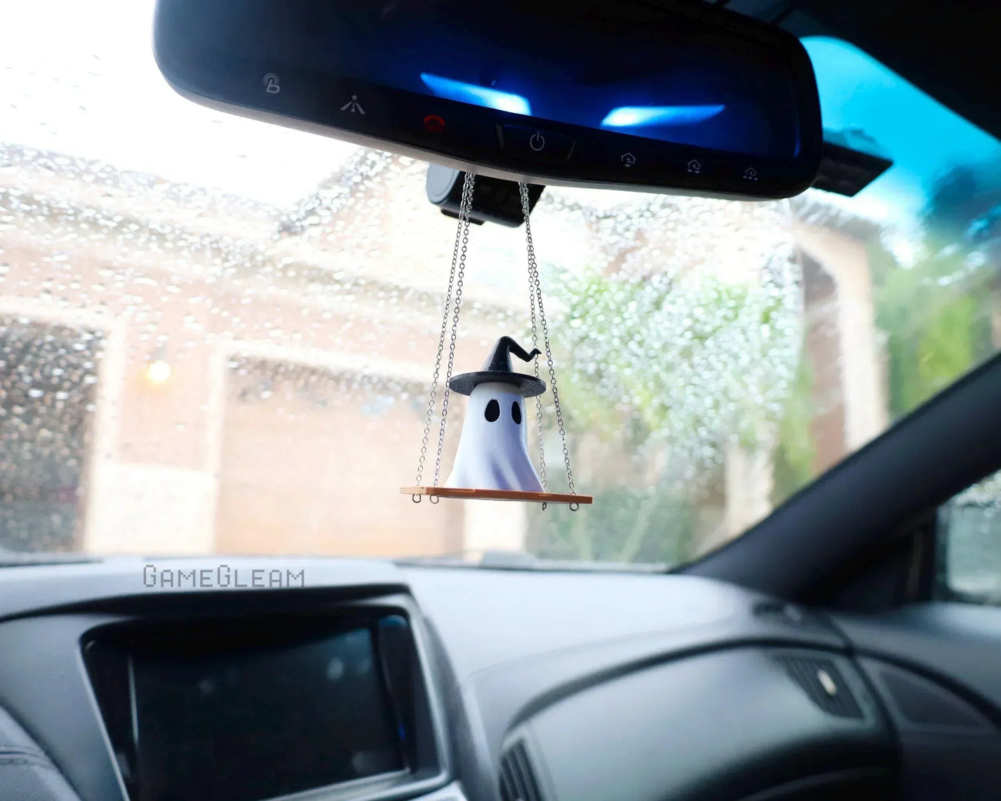 Handmade ghost car charm with witch hat on swing hanging from rearview mirror