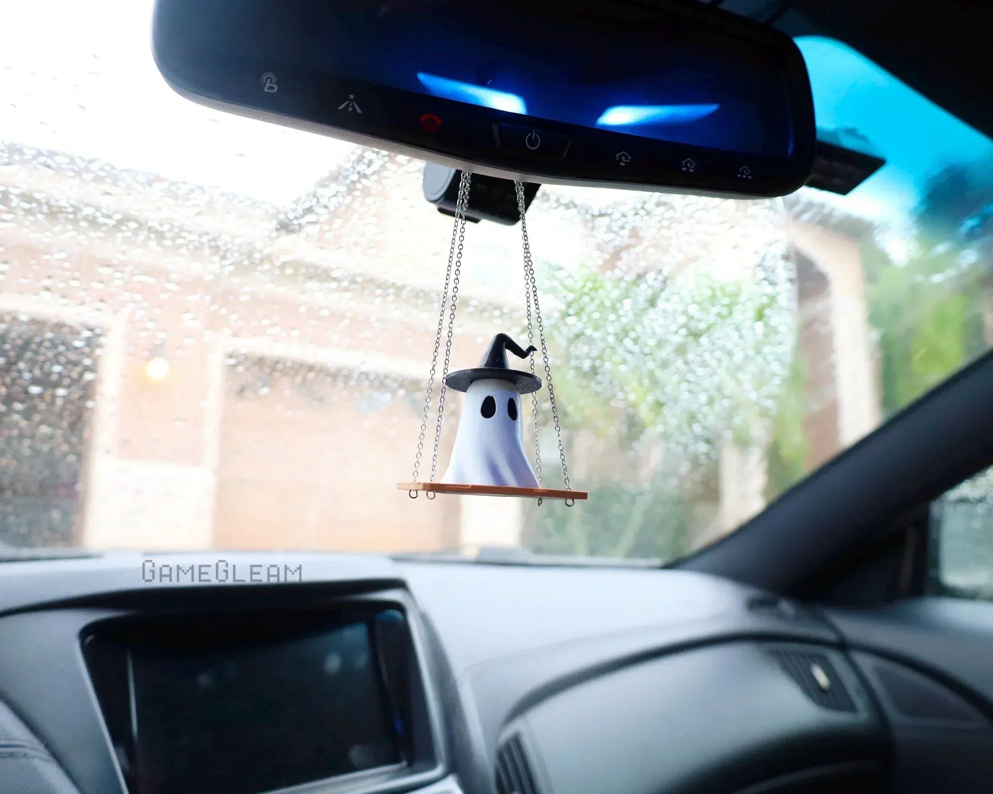 Handmade ghost car charm with witch hat on swing hanging from rearview mirror