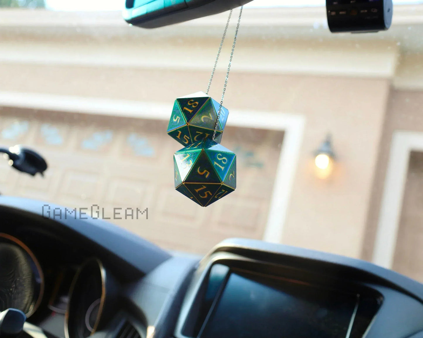 Handmade holographic twenty-sided dice charm hanging from car mirror, gaming accessory