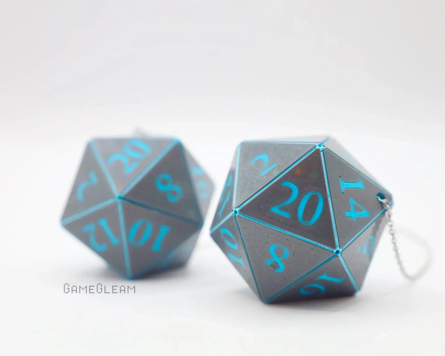 Gray twenty-sided dice charms with blue numbers and chain for car or gamer decor