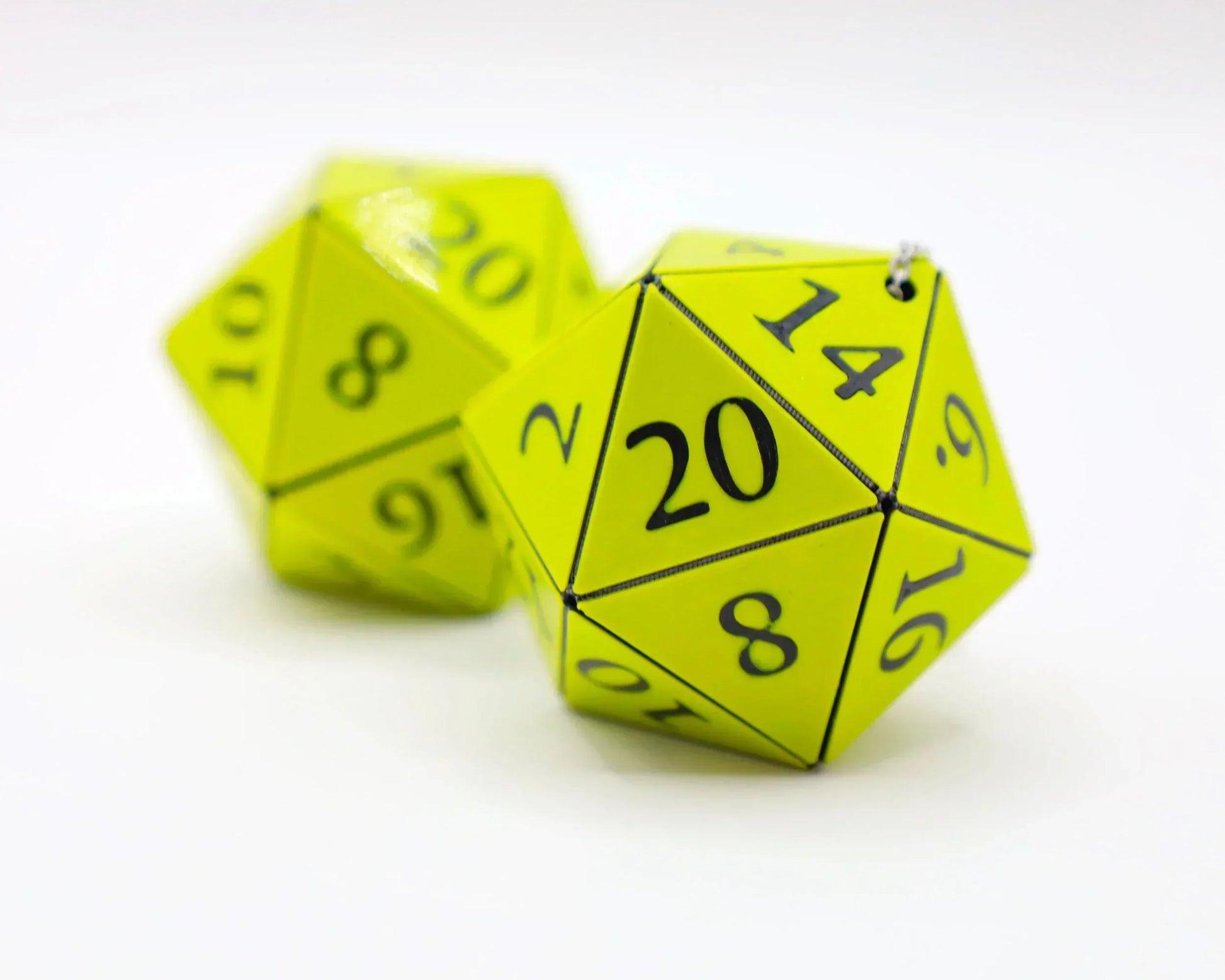 Yellow handmade 20-sided dice car charms for tabletop RPG enthusiasts on white background