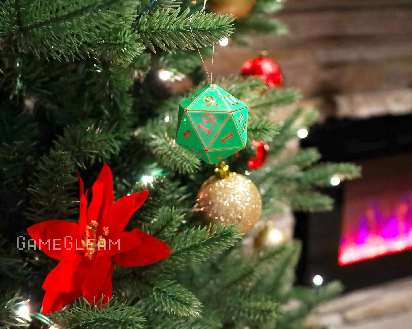 Green twenty-sided dice ornament hanging on Christmas tree with festive decorations