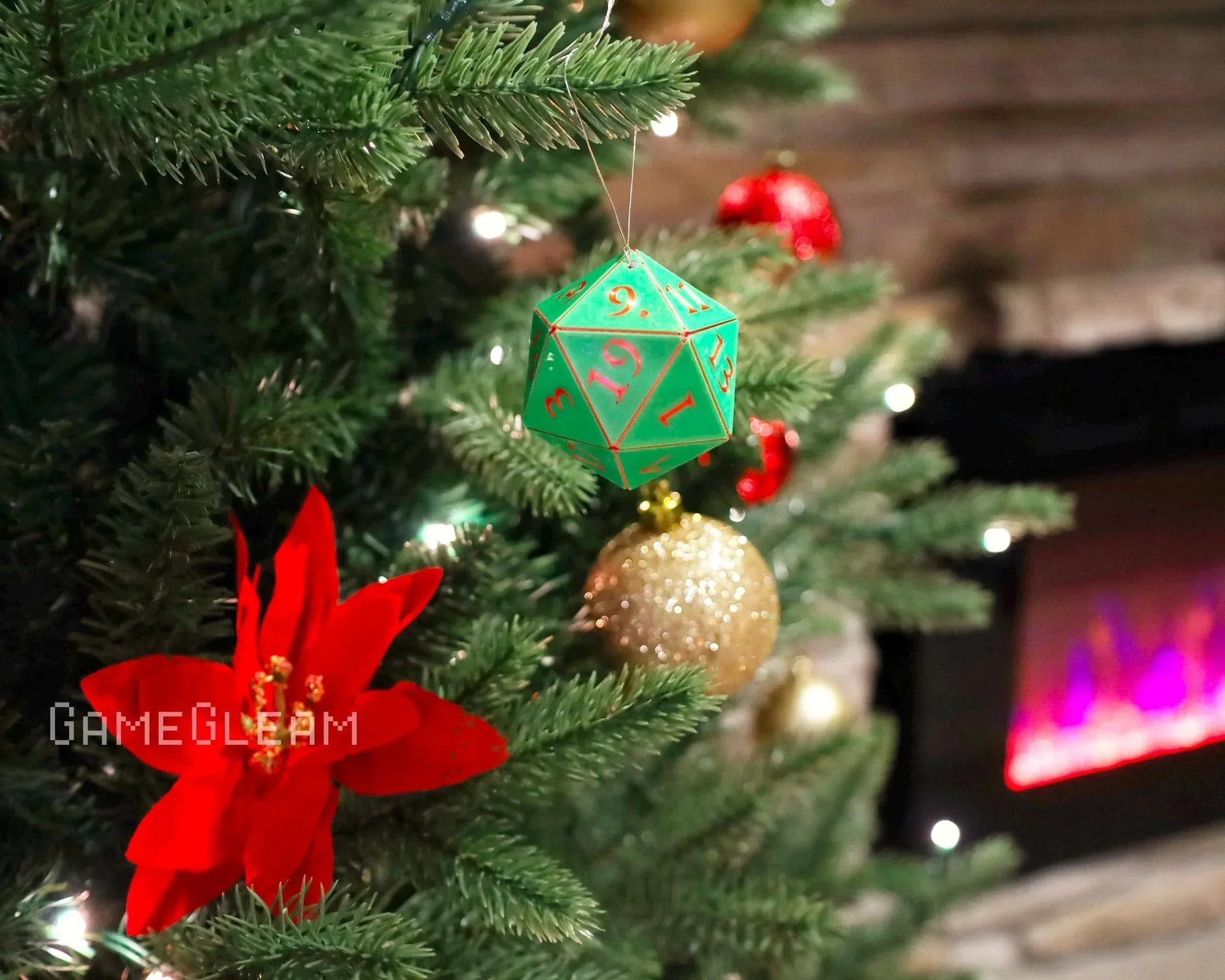 Green twenty-sided dice ornament hanging on Christmas tree with festive decorations