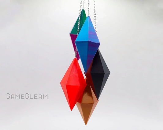 Colorful geometric polyhedral dice hanging as car dice charms on chains