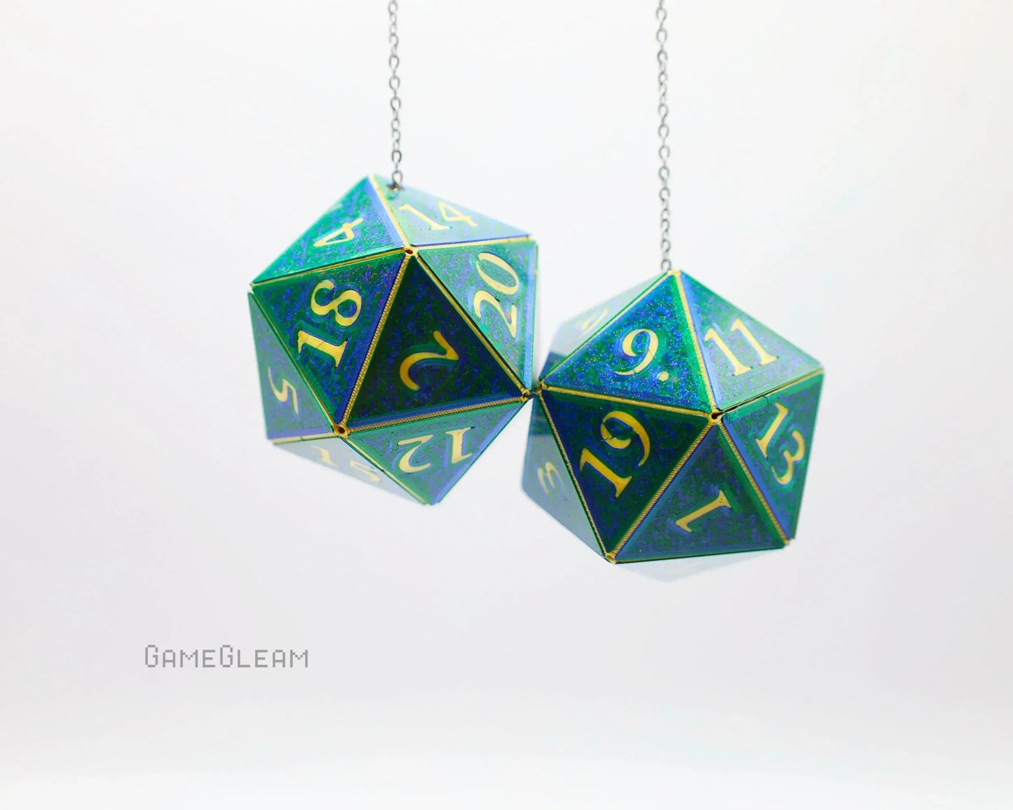Holographic green and gold twenty-sided car dice charm on a silver chain for tabletop gamers