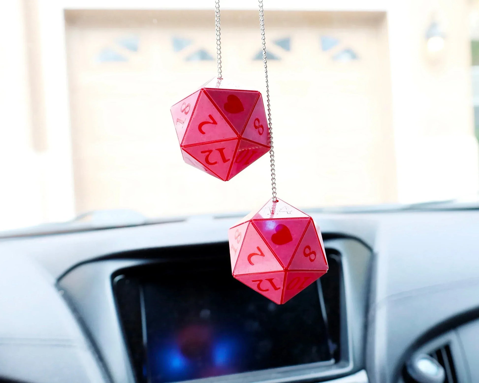 Red twenty-sided dice car charm hanging from rearview mirror, gamer gift accessory
