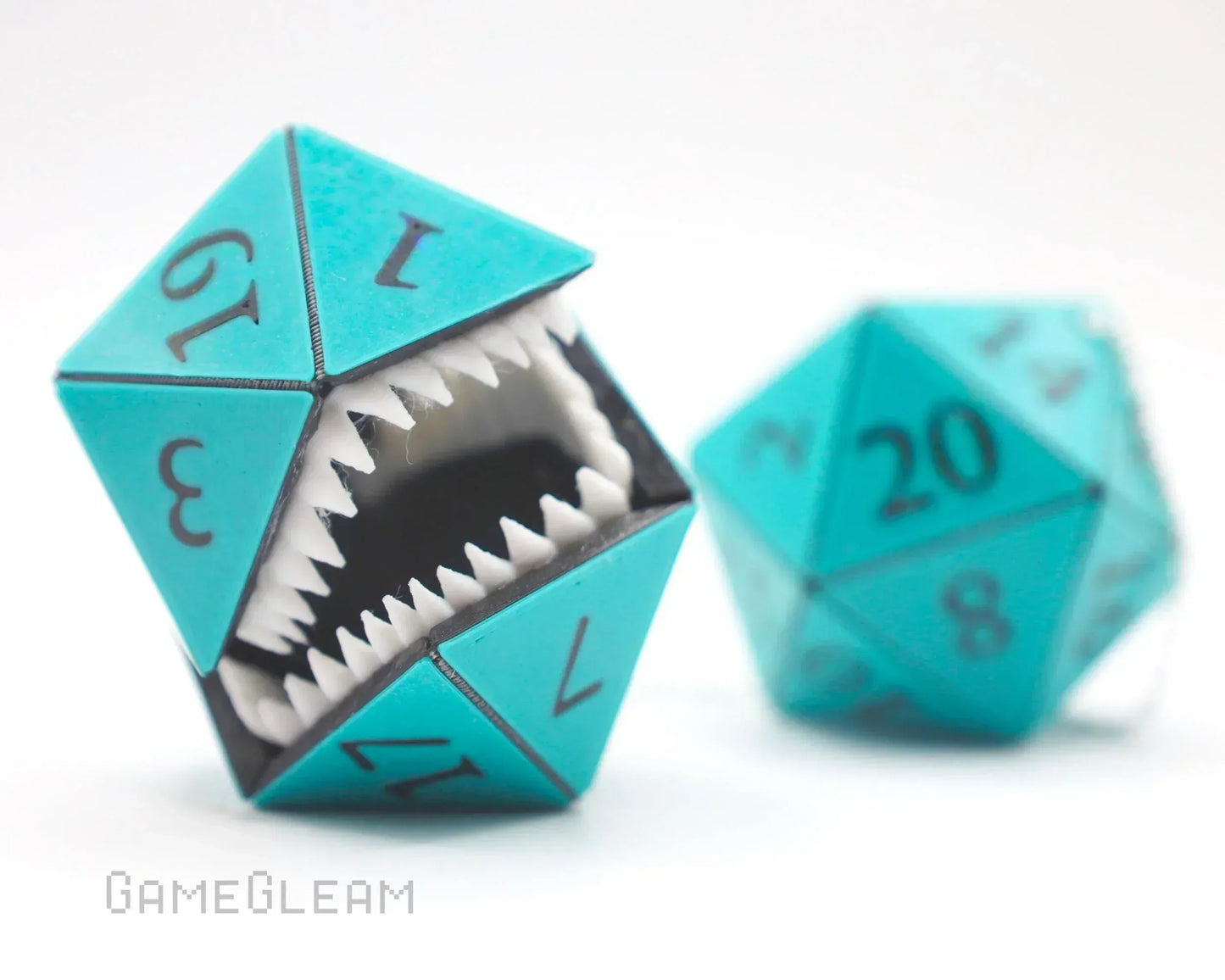 Turquoise twenty-sided dice, one with sharp teeth, unique RPG gamer accessory