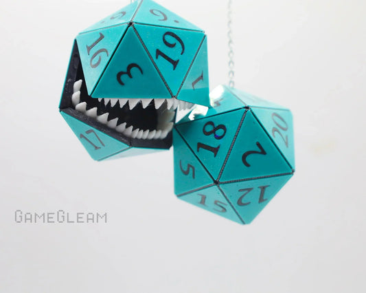 Handmade teal polyhedral dice car charm with teeth, geeky RPG gift accessory