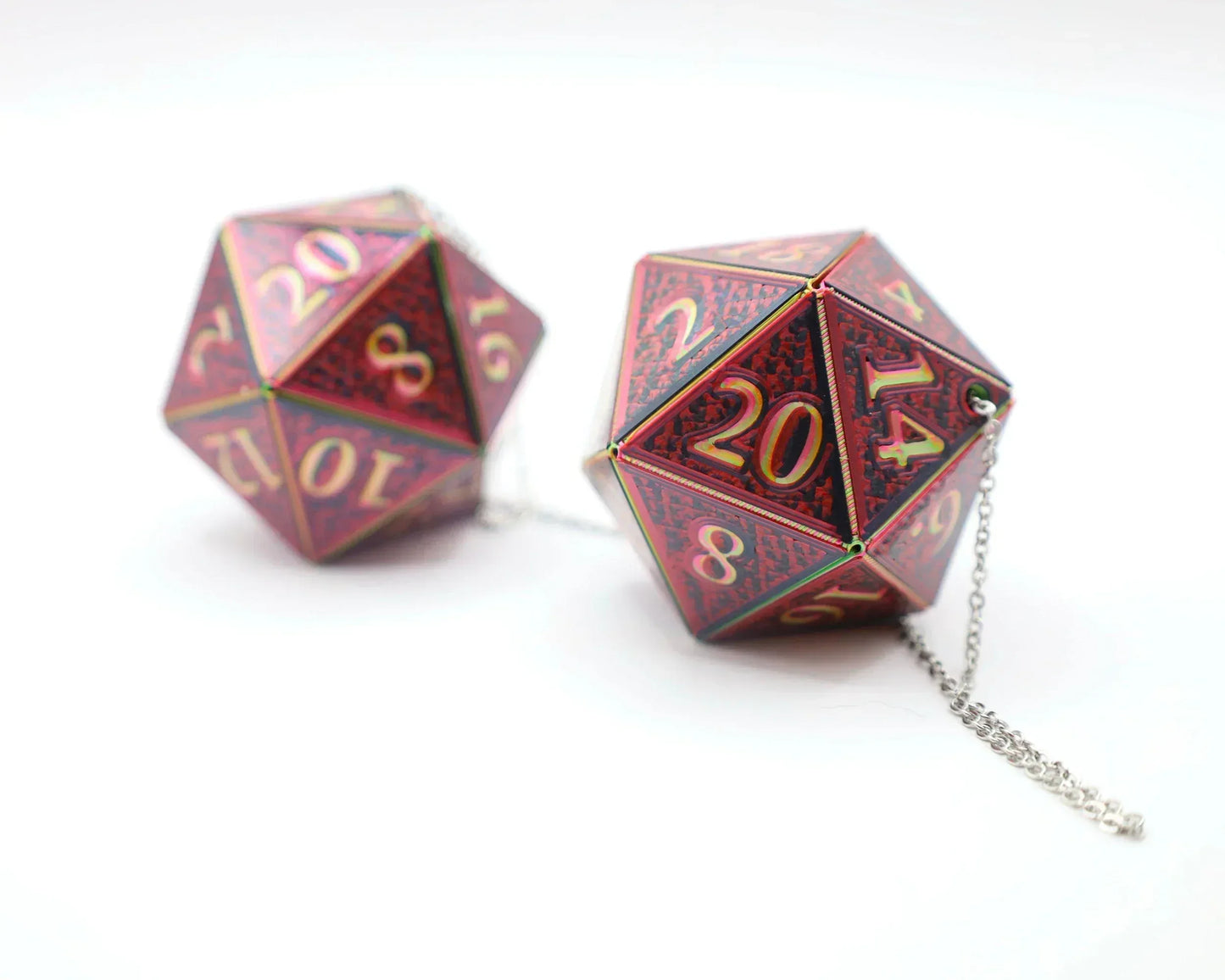 Pair of holographic red 20-sided dice car charms with gold numbers and silver chain