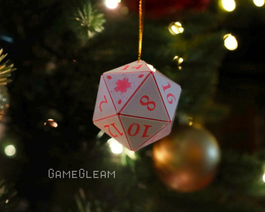 White twenty-sided dice ornament with pink numbers on a Christmas tree, festive decor for gamers