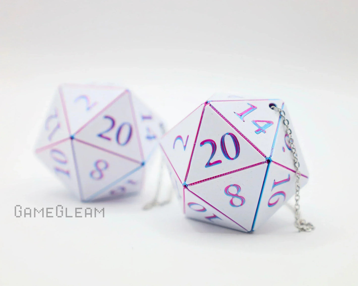 Pair of white holographic twenty-sided dice car charms with pink and blue numbers and chain