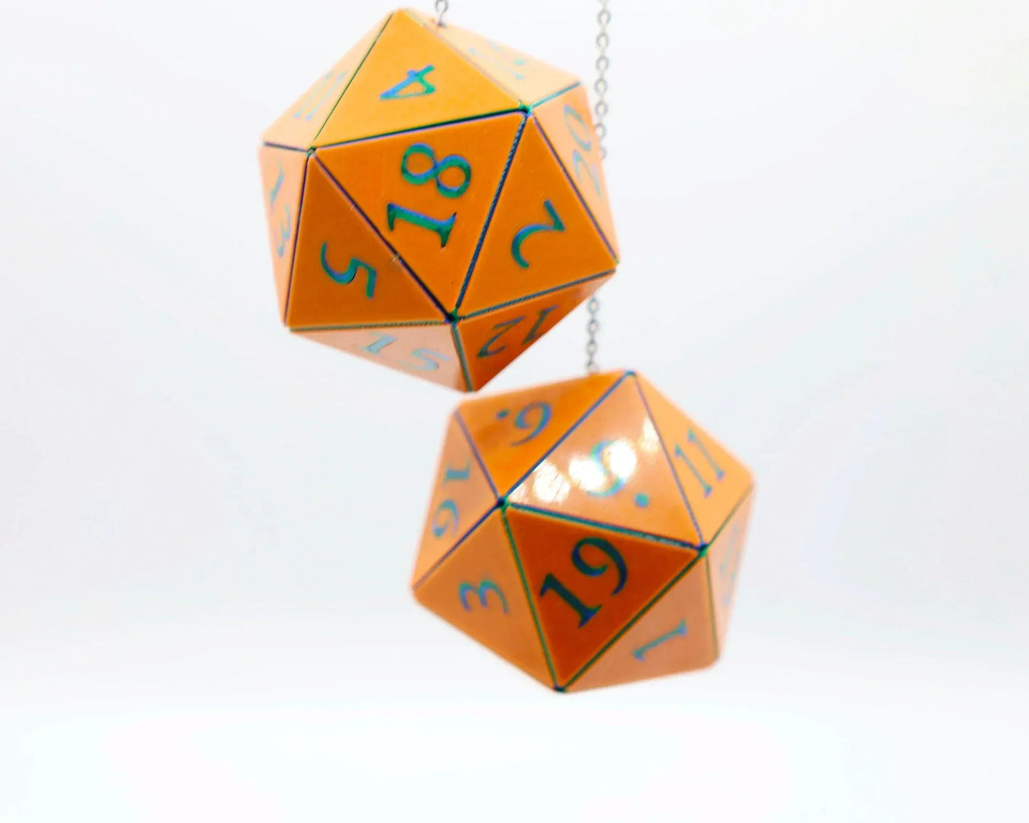 Orange twenty-sided dice car charm with teal numbers, handmade for tabletop RPG fans