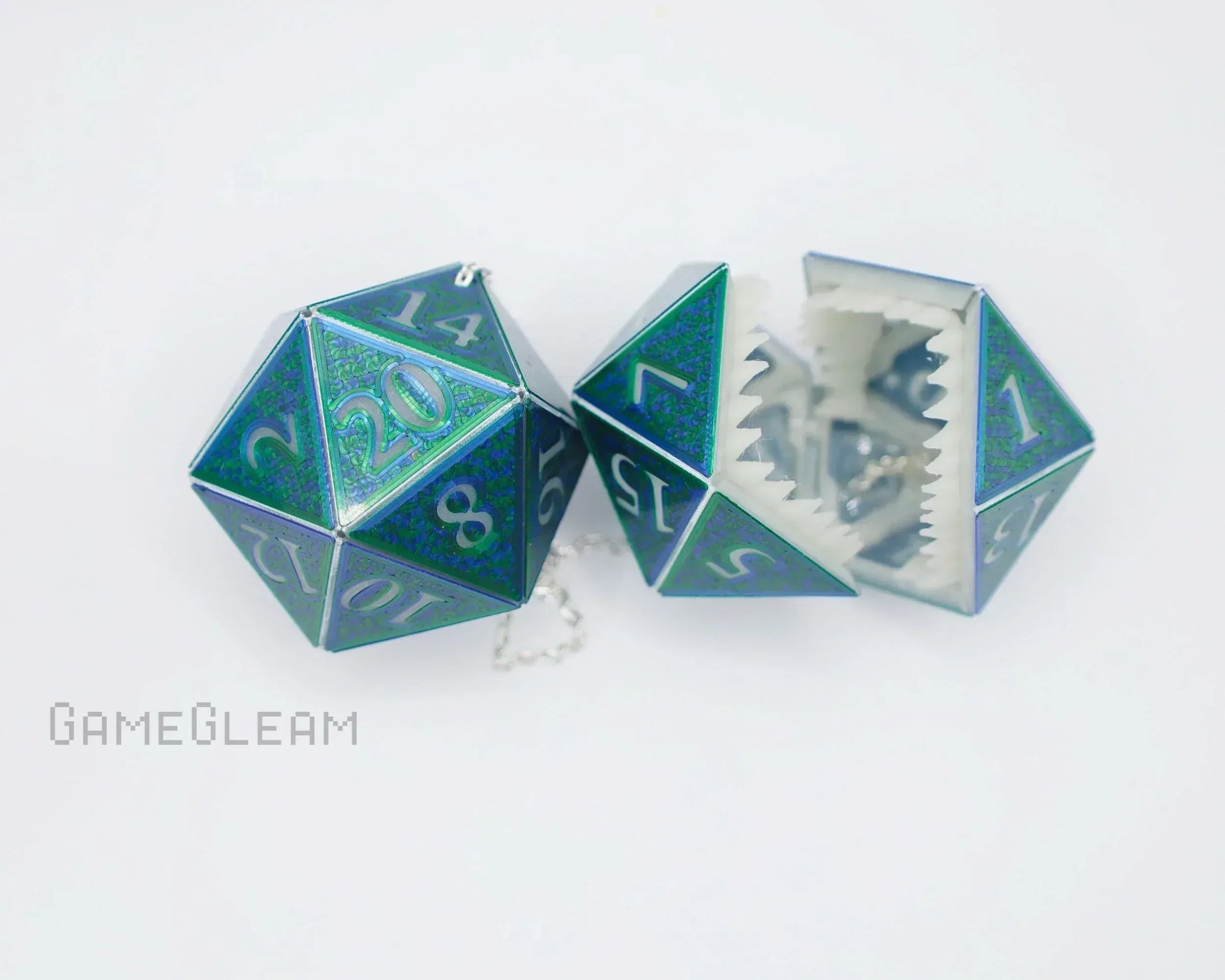 Holographic green and blue twenty-sided dice charms with hinged design and chain, for tabletop RPG fans.