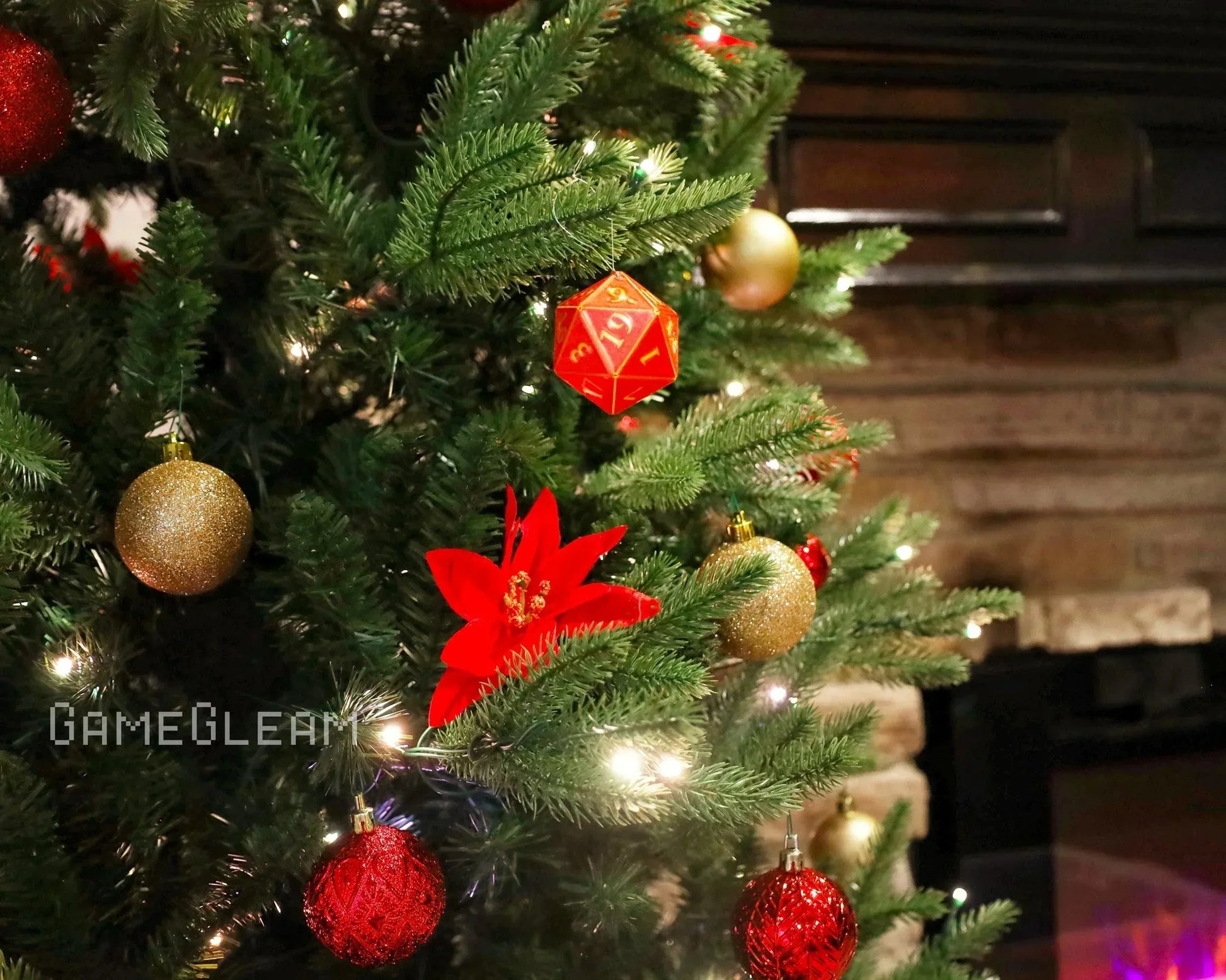 Handmade red polyhedral dice Christmas tree ornament with festive baubles and lights