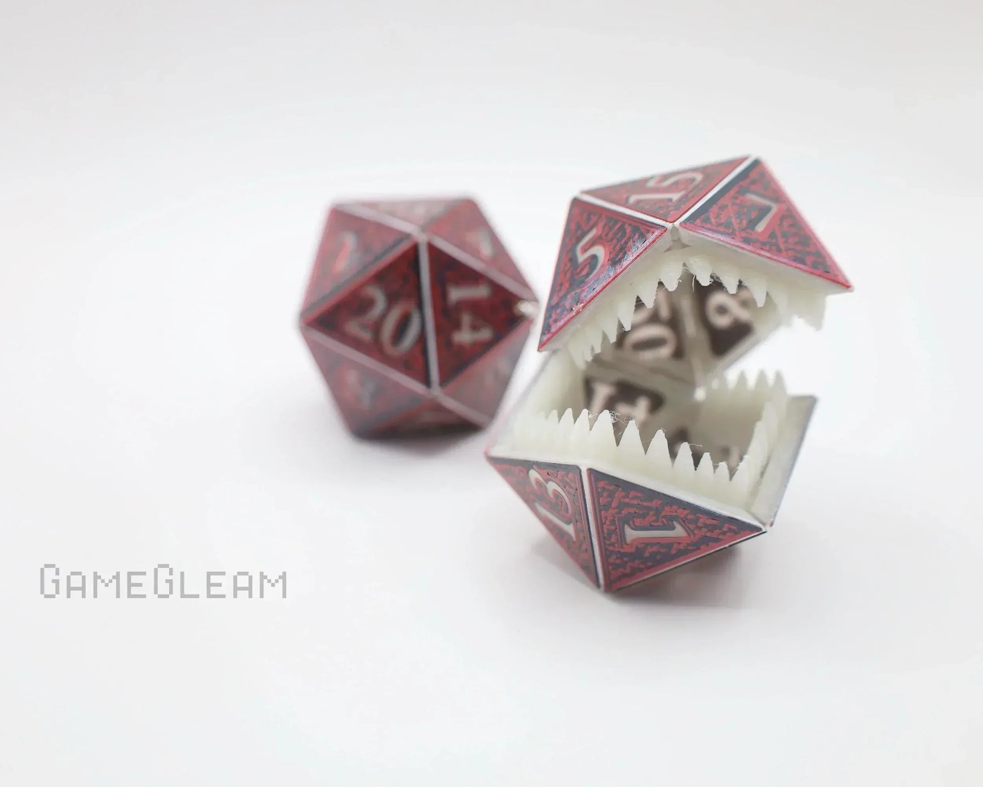 Handmade polyhedral dice with monster mouth design, fantasy tabletop accessory