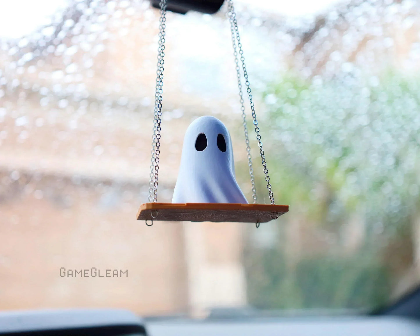 Handmade ghost figurine hanging on a swing car charm, interior car accessory