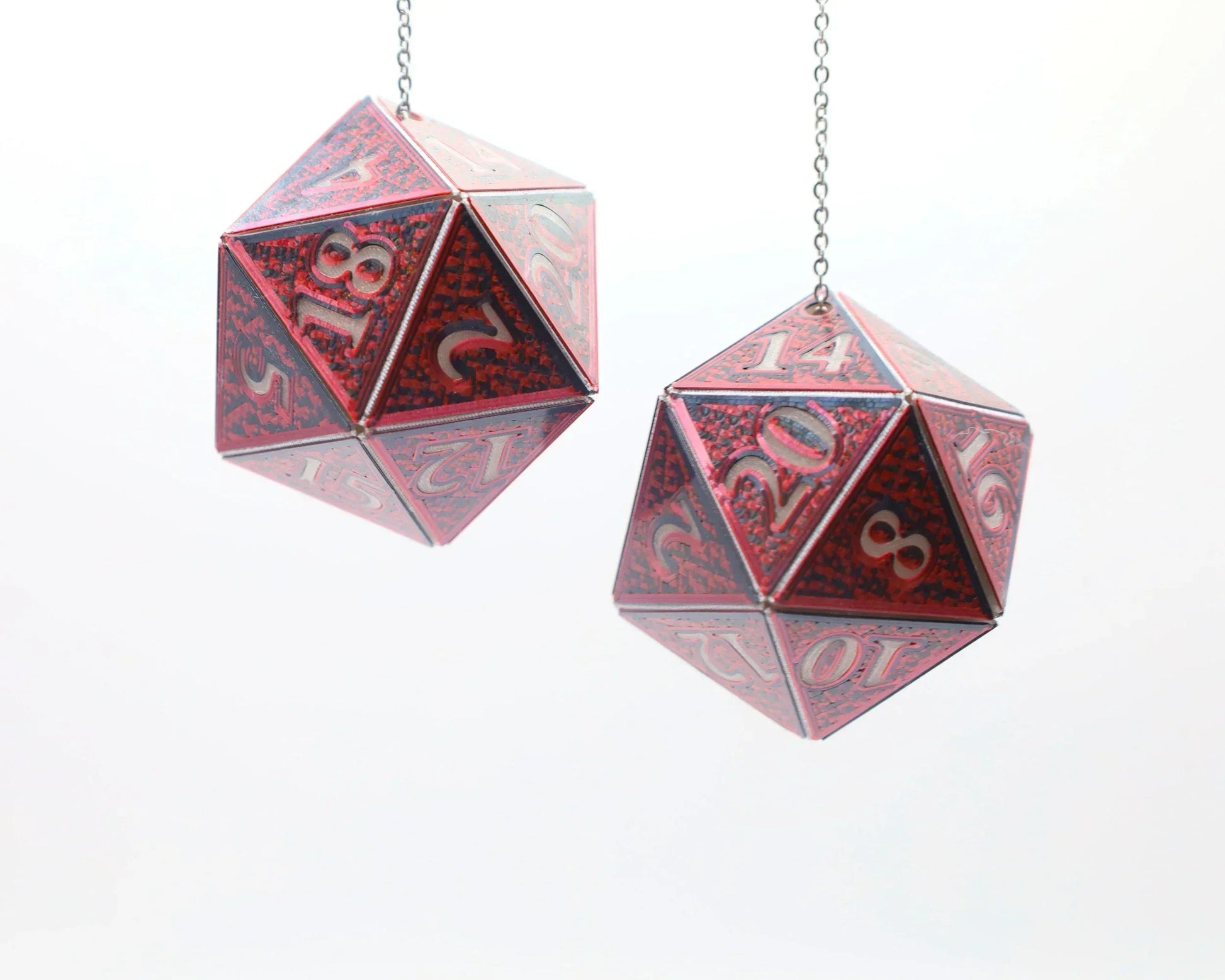 Red holographic 20-sided dice car charms hanging from chains, RPG tabletop accessory
