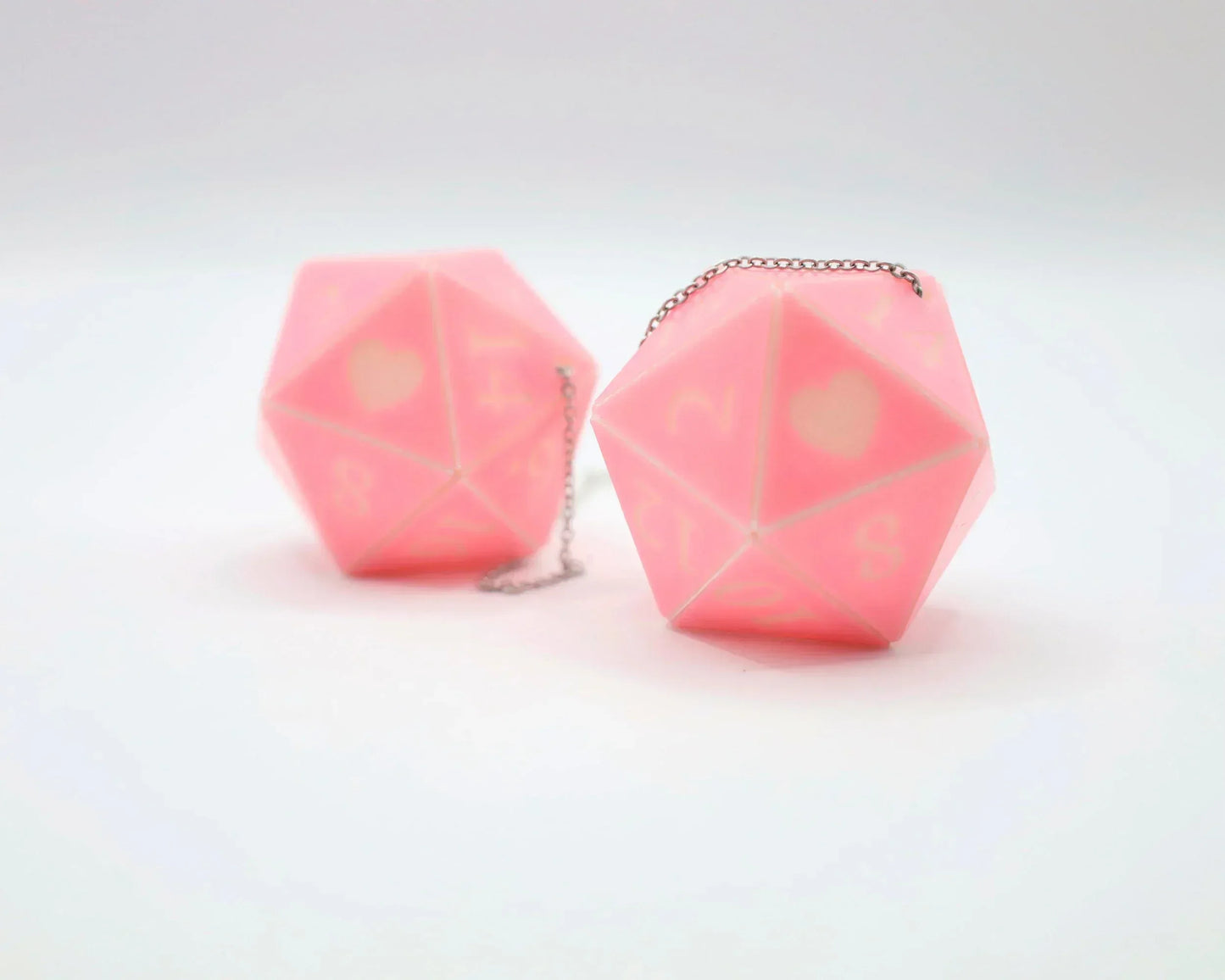 Pink handmade twenty-sided dice car charms with heart design and chain, gamer accessory