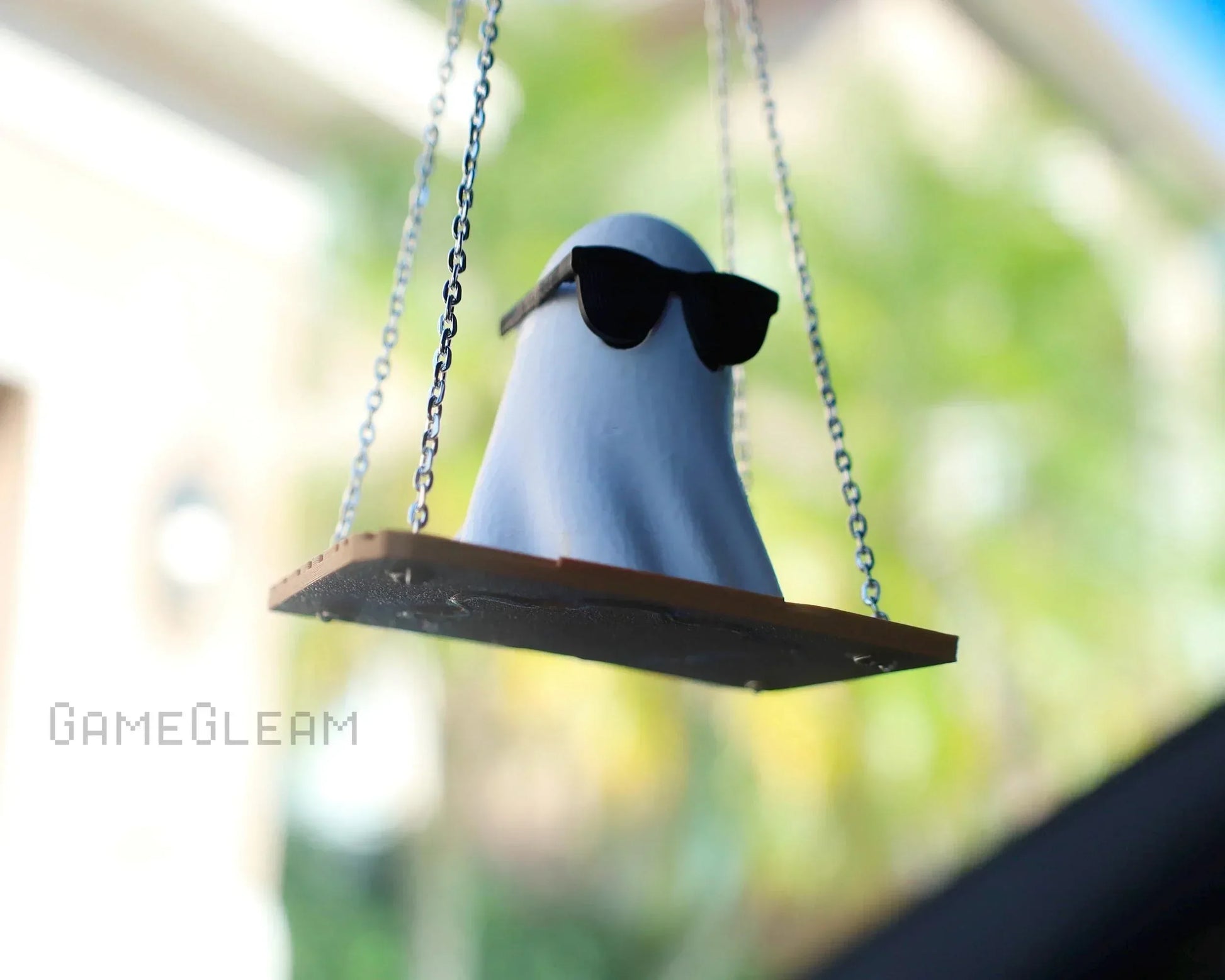 Cute ghost car charm with sunglasses on swing, handmade hanging ornament for car interior.