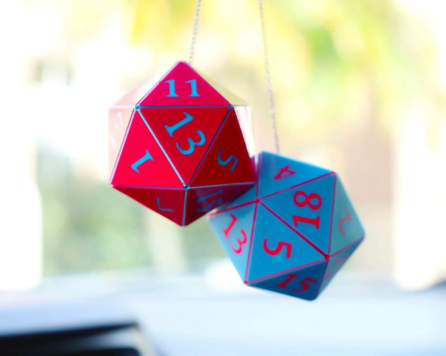 Hanging red and blue 20-sided dice car mirror charms for tabletop gaming fans