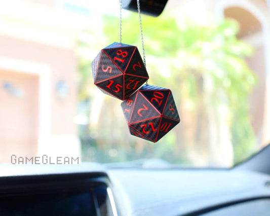 Handmade black and red twenty-sided dice car charm hanging from rearview mirror