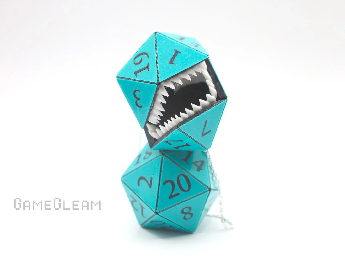 Teal handmade polyhedral dice charm with monster teeth, unique RPG car accessory