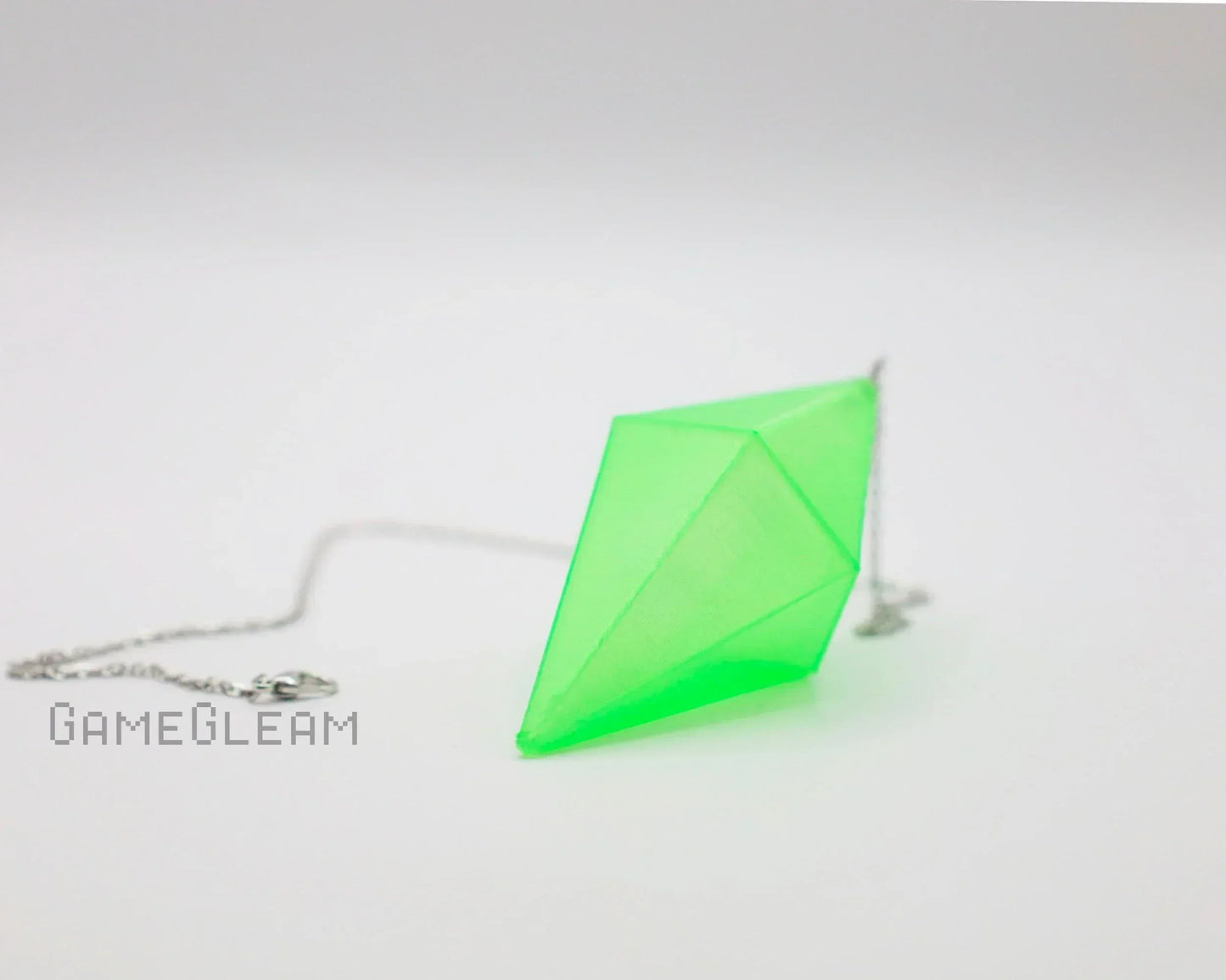Handmade neon green geometric pendant with silver chain, minimalist gamer accessory.