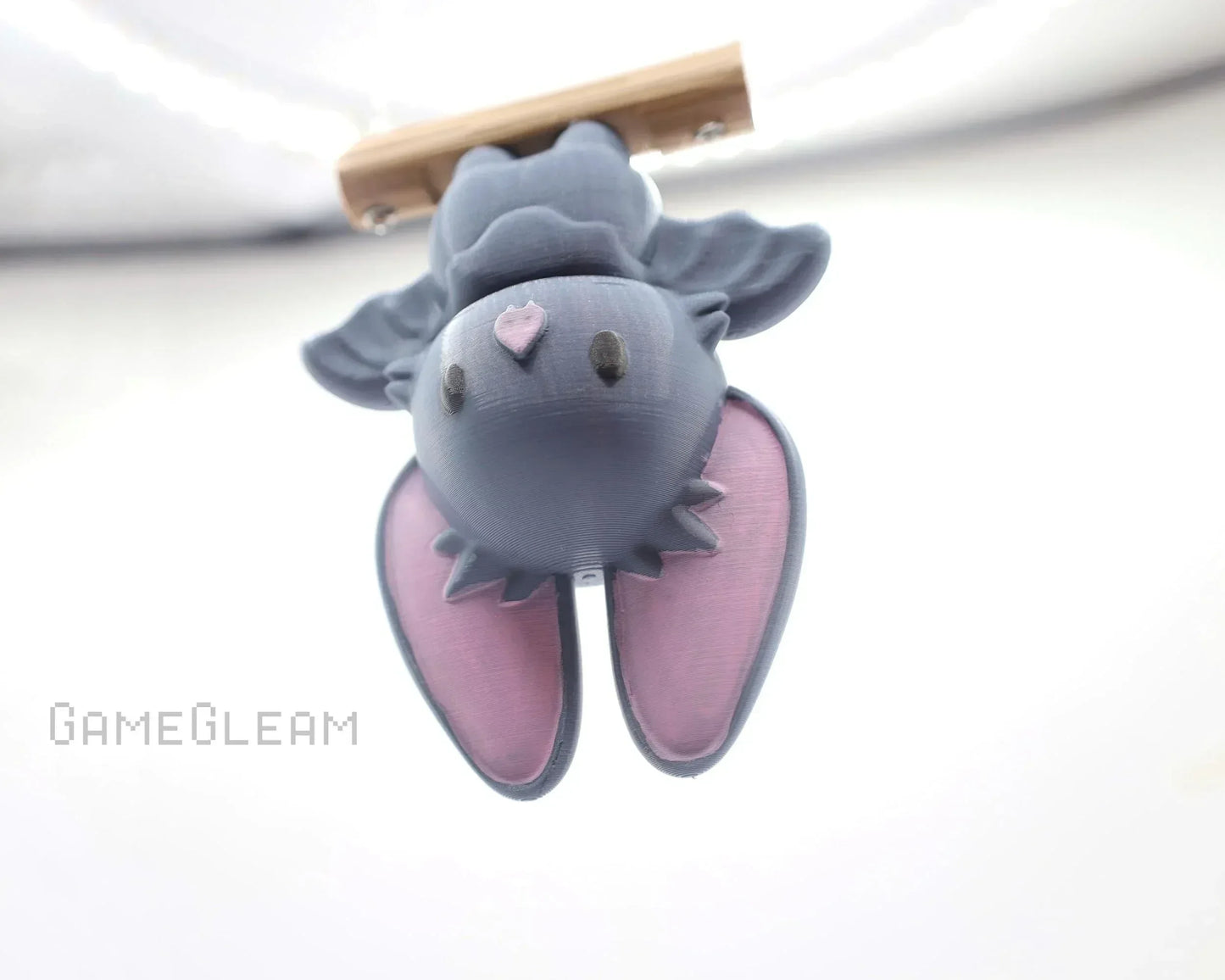 Cute handmade purple bat charm with pink ears hanging upside down, car accessory gift