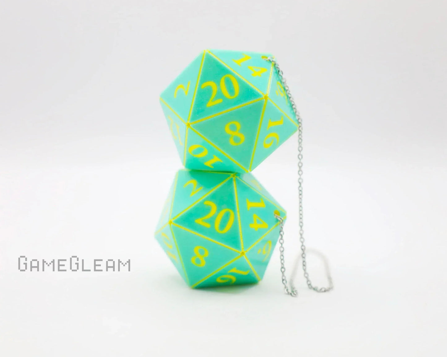 Aqua green twenty-sided dice car charm with yellow numbers and a silver chain on white background