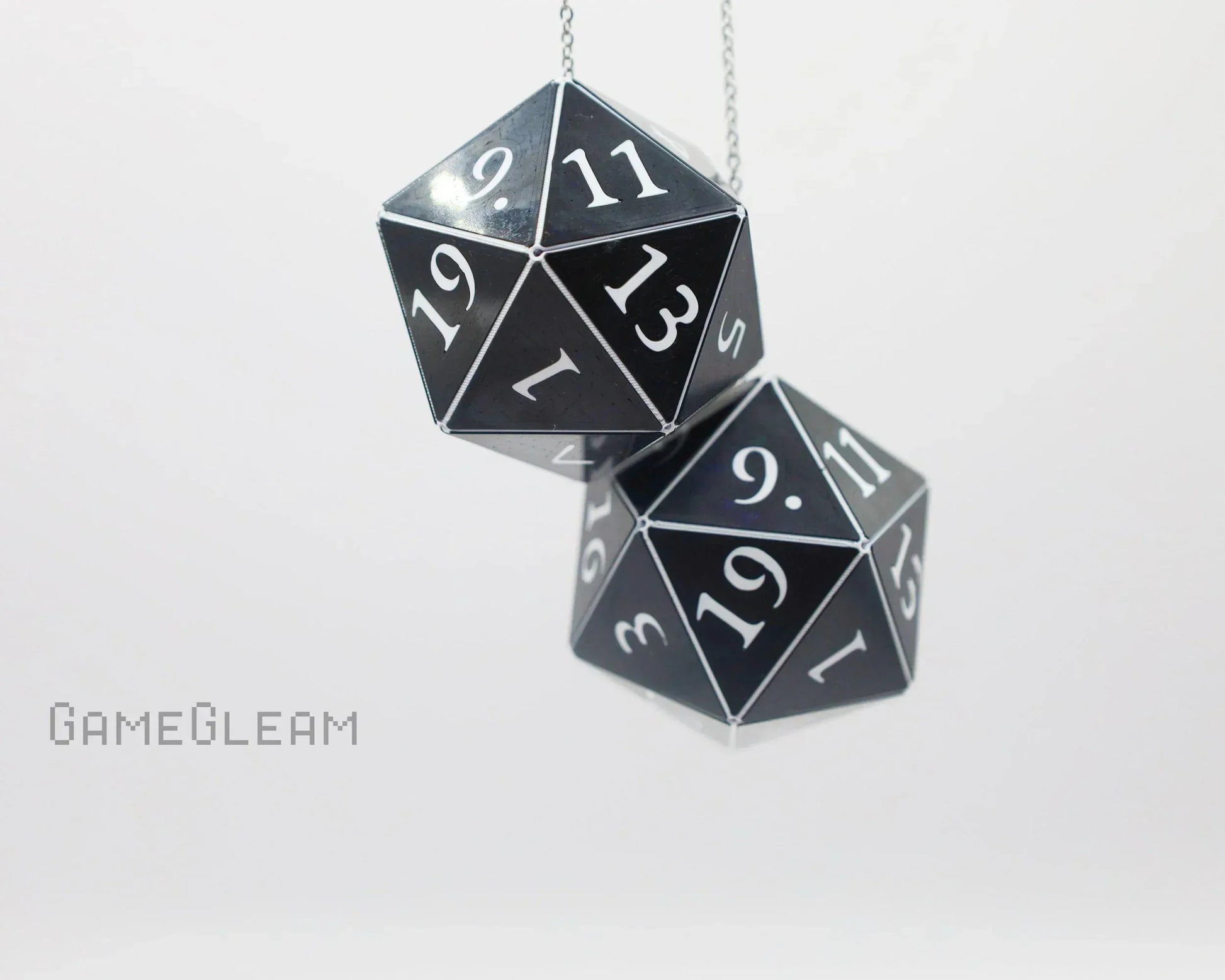 Black 20-sided dice car charm for tabletop RPG fans, hanging on a silver chain.