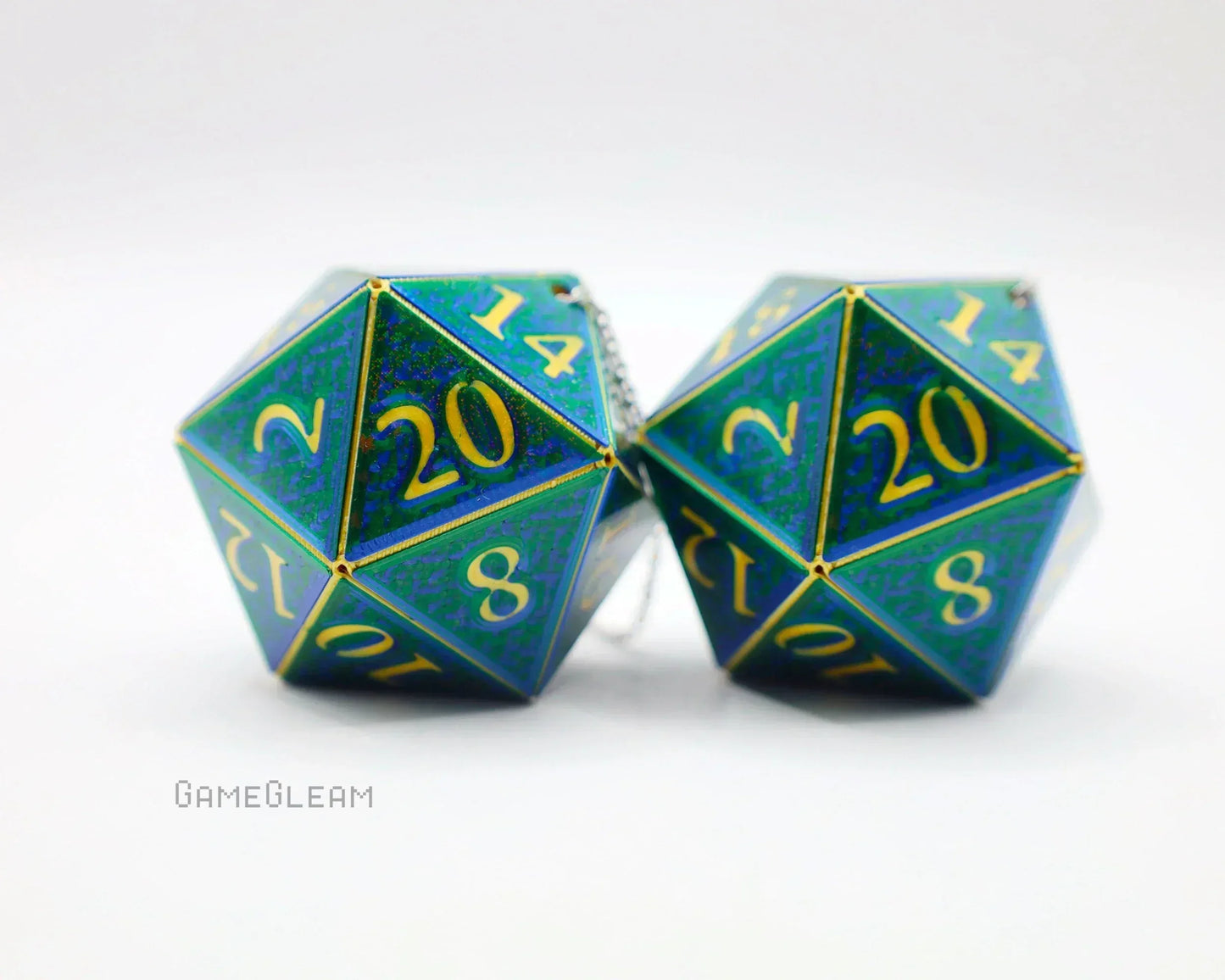 Pair of holographic blue and green 20-sided dice with gold numbers, used as car charms