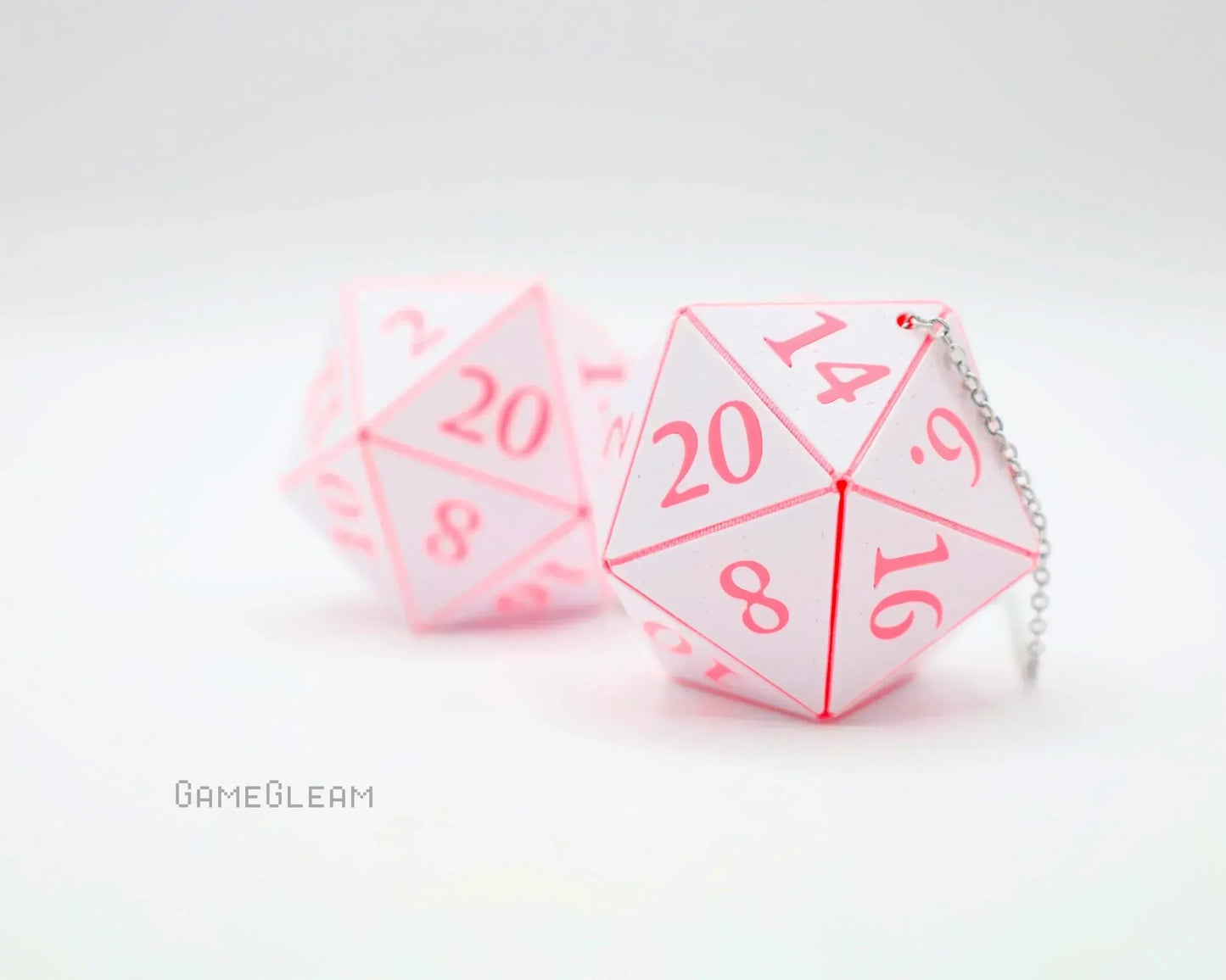 Pink and white twenty-sided dice car charm with chain for tabletop RPG enthusiasts