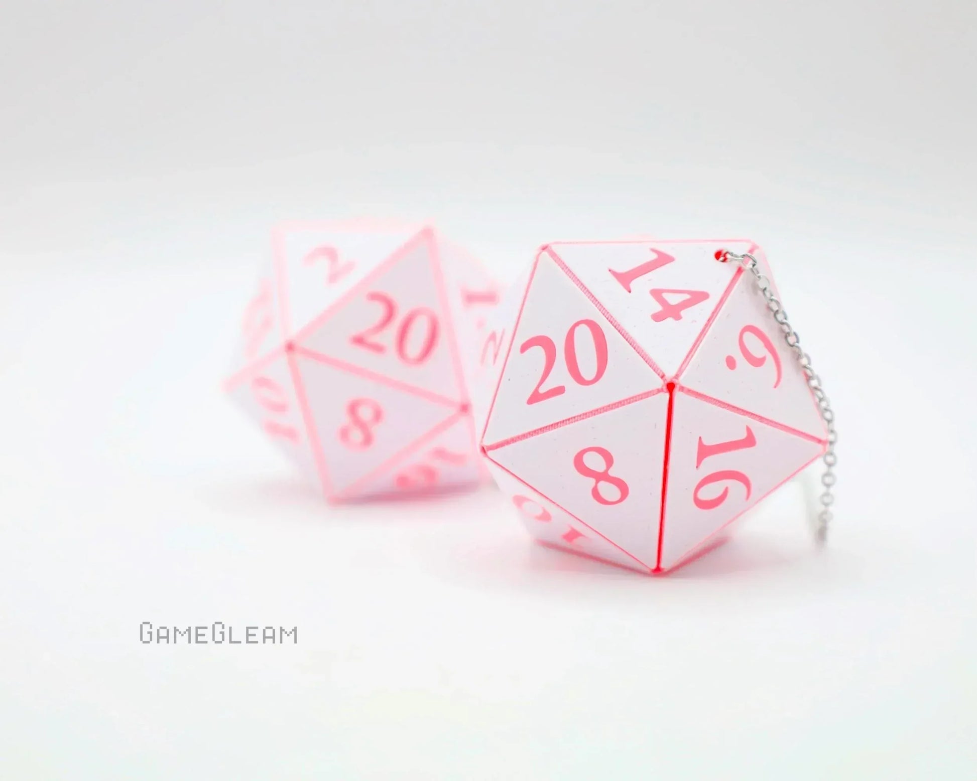 Pink and white twenty-sided dice car charm with chain for tabletop RPG enthusiasts